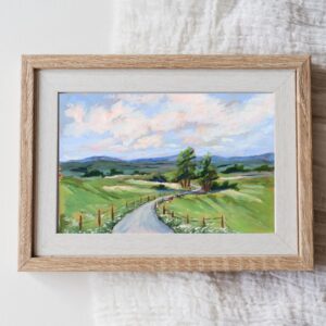Direct My Path Christian landscape painting inspired by Proverbs 3:5–6 featuring a winding country road through rolling green hills by artist Cassie Jones.